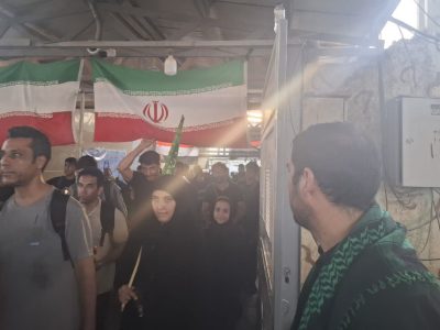 واکنش زائران اربعین به پرچم مقدس جمهوری اسلامی ایران در بدو ورود به وطن + فیلم
